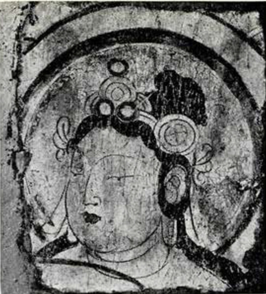 Fresco fragment showing a Bodhisattvas head, turned towards the left, in a halo with looped hair