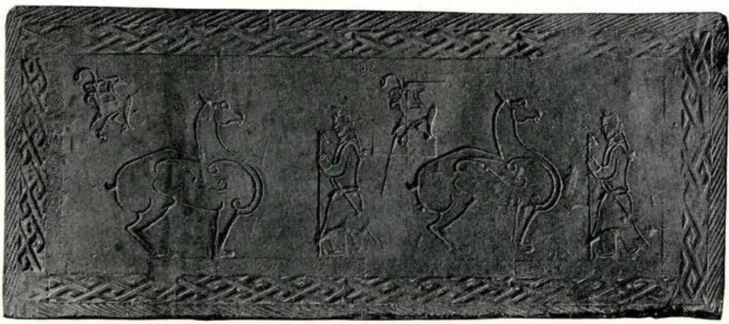 Stamped brick from a tomb depicting a horse, a phoenix, and a soldier in alternating pattern, with a geometric patterned double border