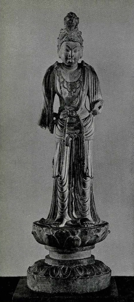 Statue of a Bodhisattva with both arms missing, wearing draped clothing
