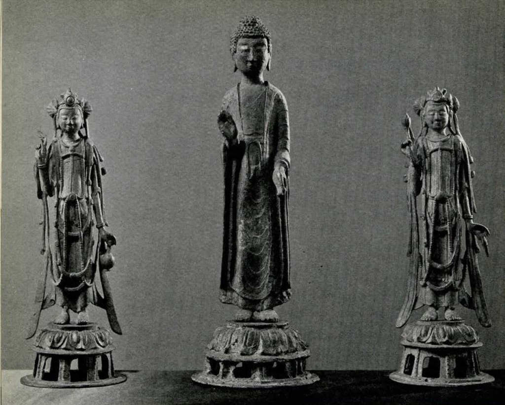 Bronze altar group of two Bodhisattvas in elaborate scarves and headdresses holding willow branches and objects, a Buddha Amitabha in the middle in simple garb