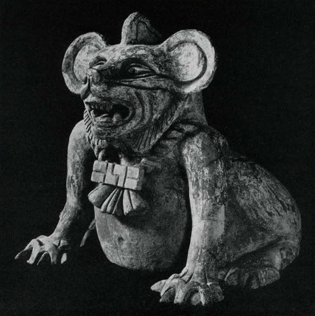 Effigy censer with thick jaguar body and head of bat or rat, wearing a necklace