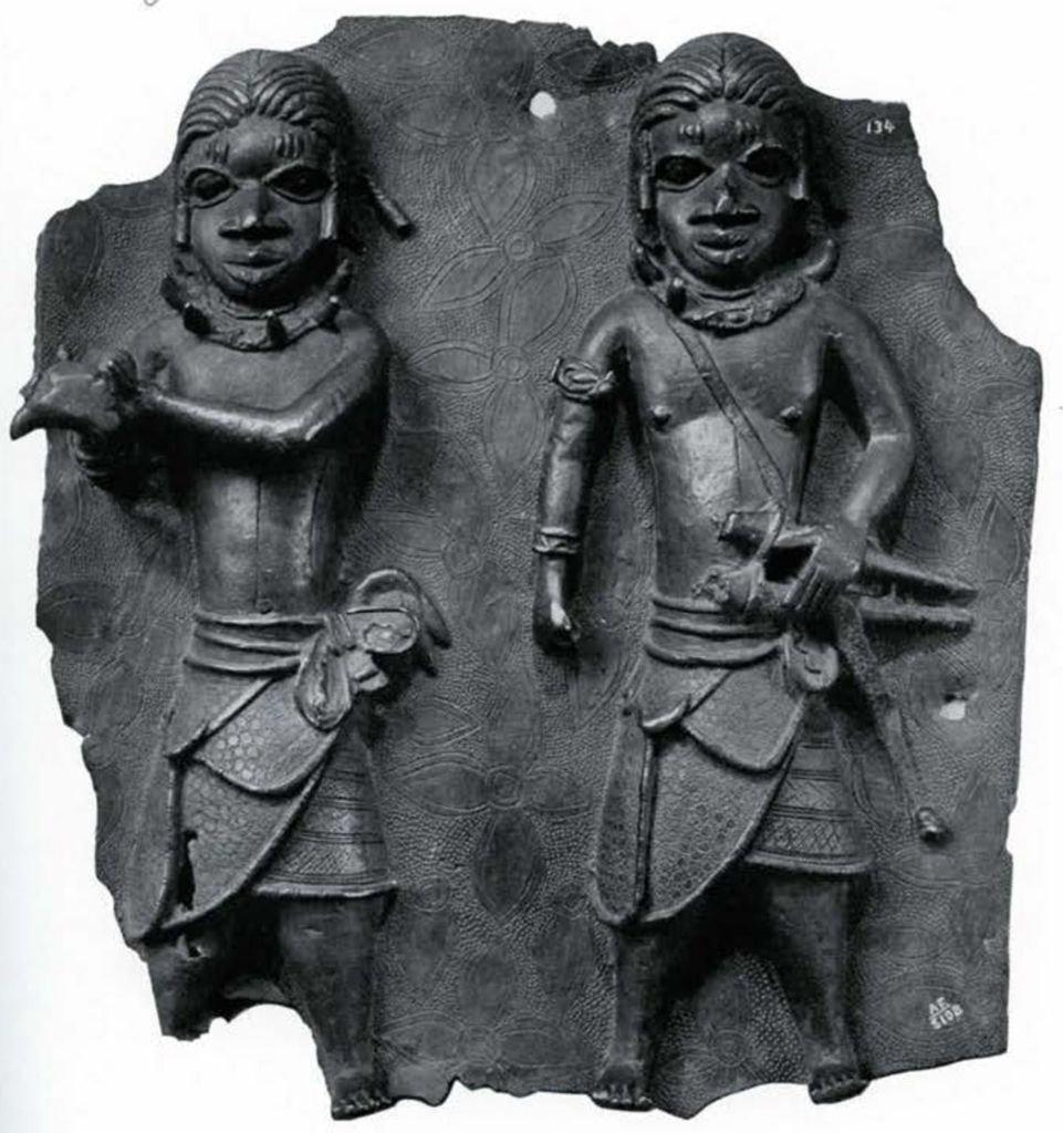 Bronze plaque of two figures in relief, one holding an ox's head.