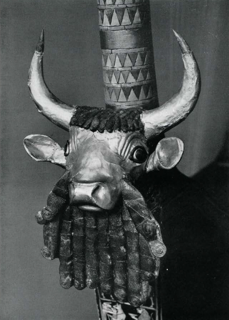 Figurine of a bull's head from a lyre, gold horns and blue curly hair and beard