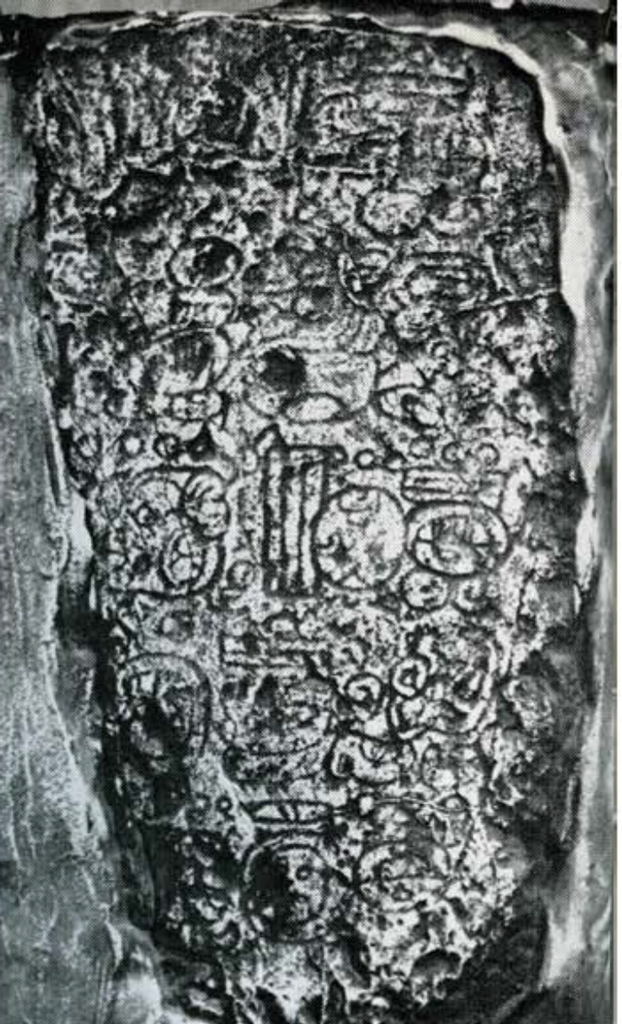 Cast of Stela 5 with carvings emphasized to better show glyphs.