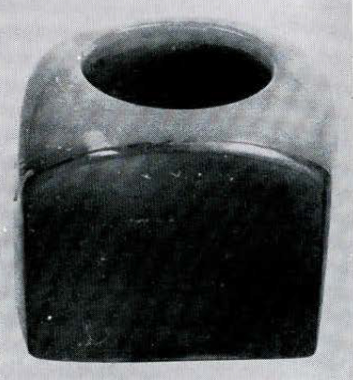 A cube shaped thumb ring.