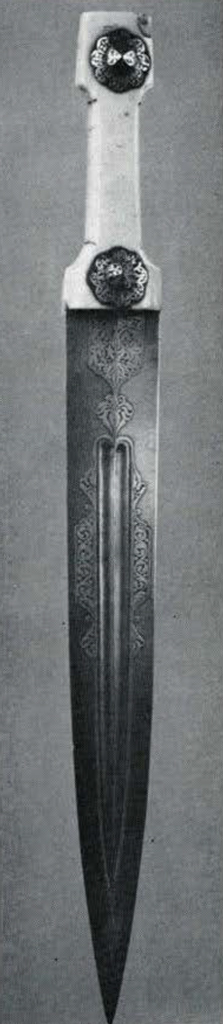 An ornate dagger with ivory hilt.