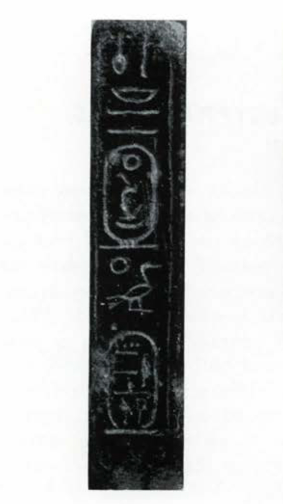 Bottom of a figurine, showing inscription.