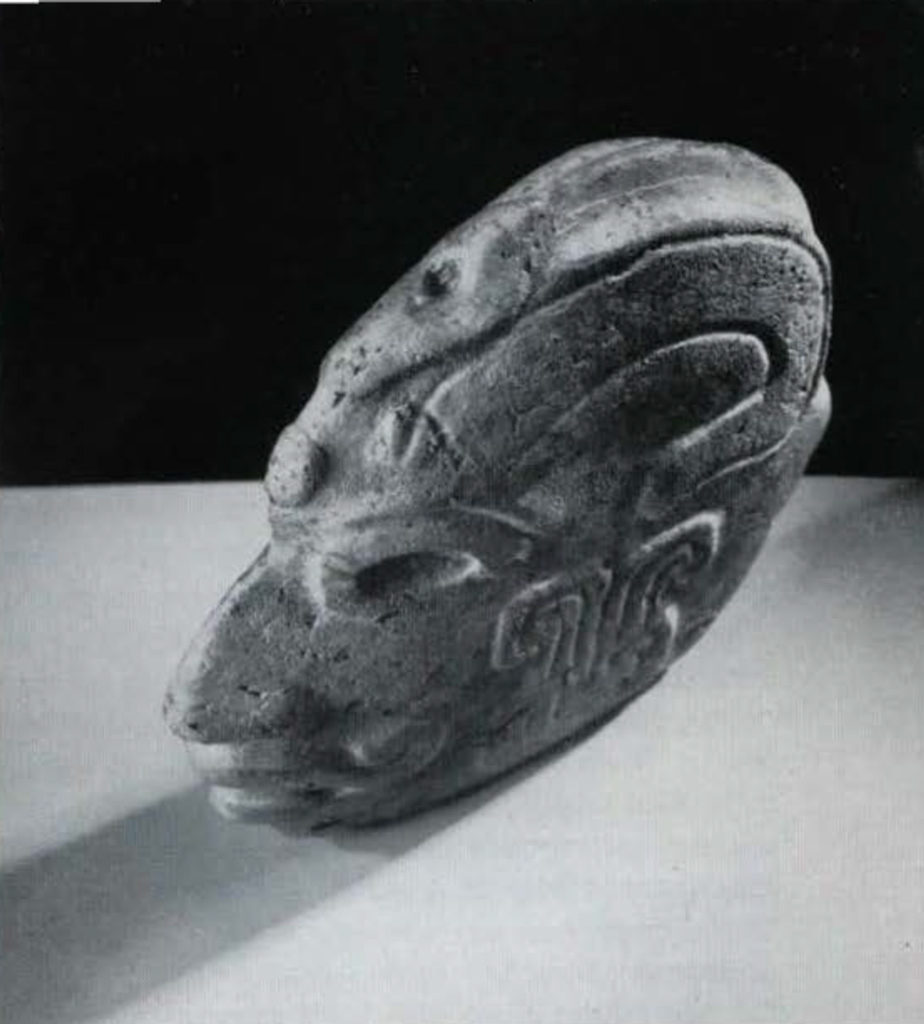 3/4 view of stone head showing the thinness of the stone.