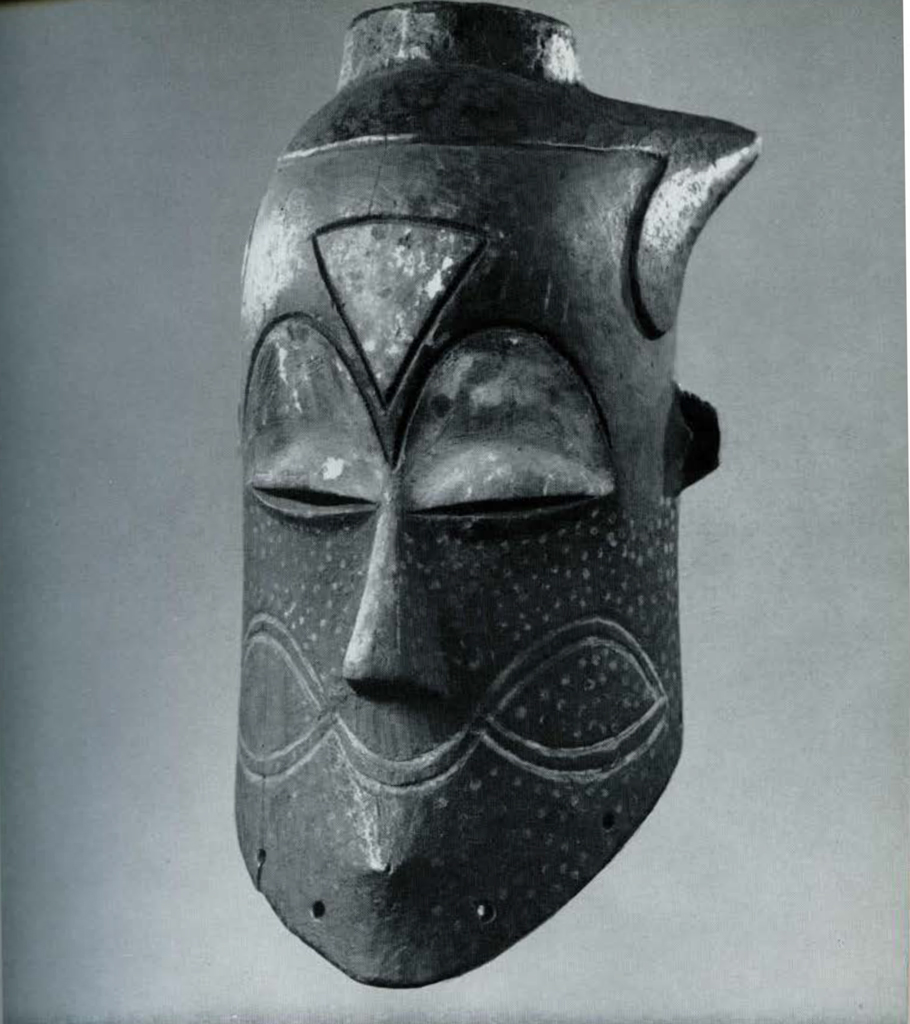 Wooden mask with triangle carved into the forhead.