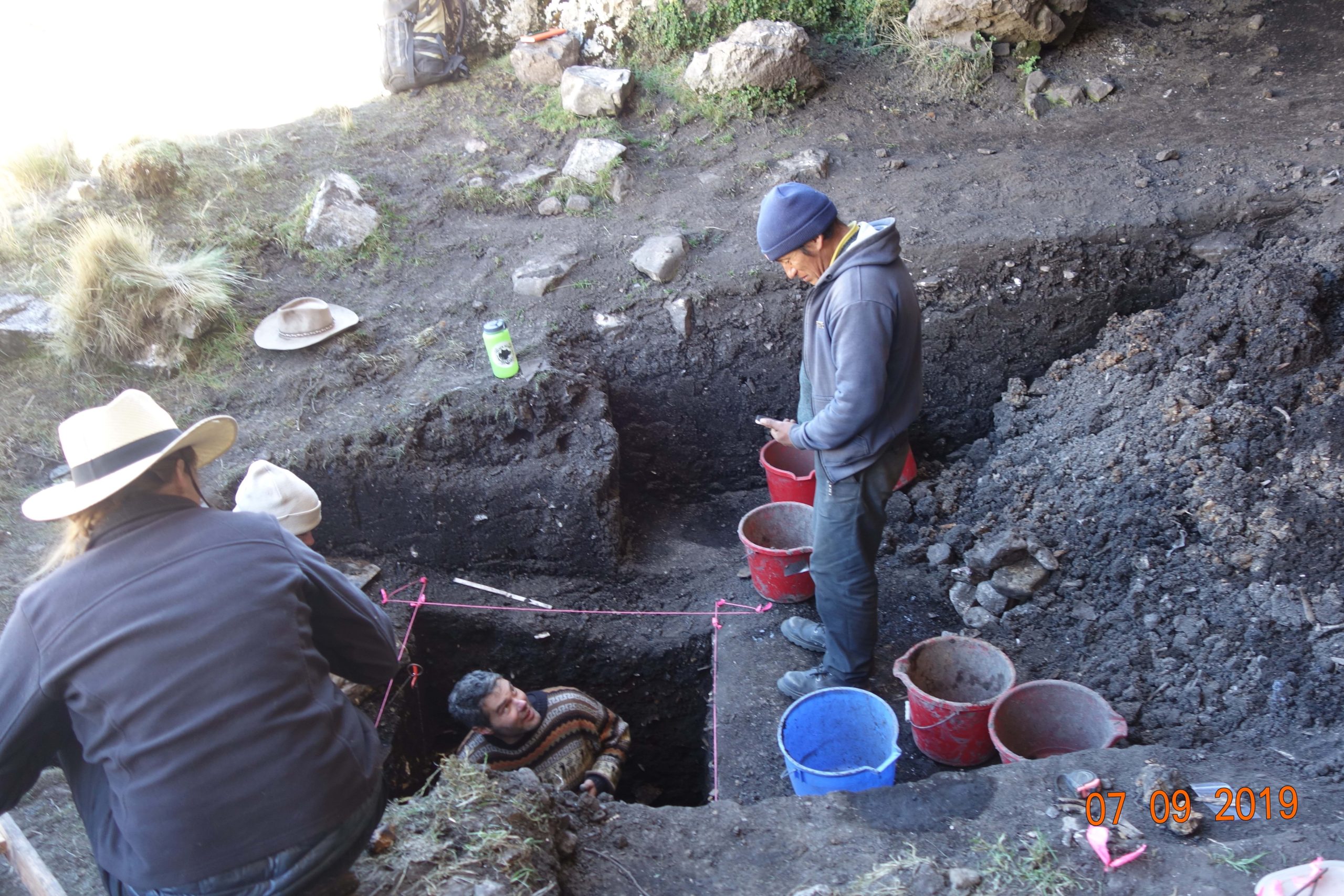 Excavators working in the field.