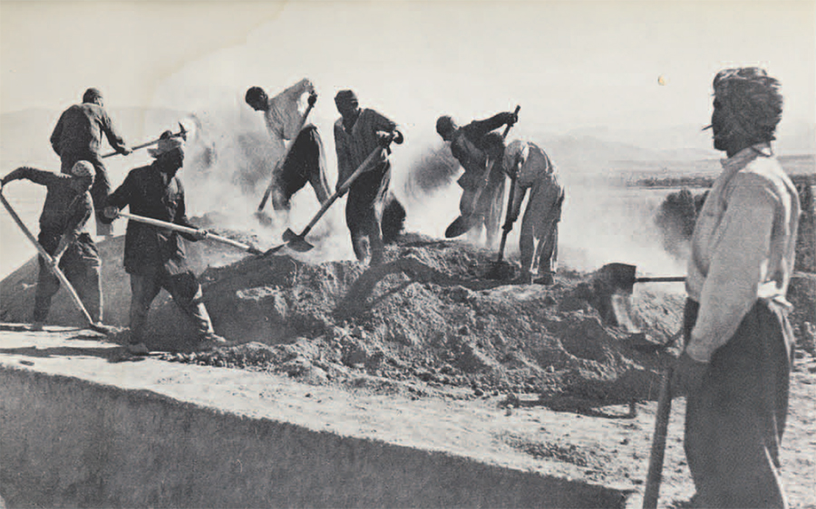 Photo of men digging