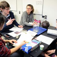 students sitting around a table