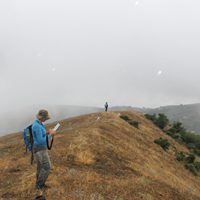 photo of people on hill