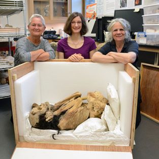 Photo of Jane, Page, and Janet with mummy