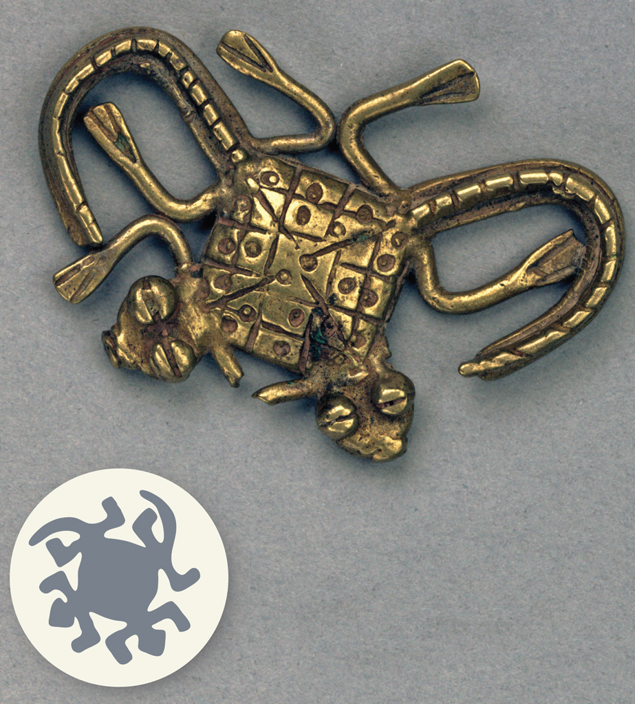 Gold weight in the shape of two lizards in a cross, a square design on the backs where the lizards overlap.