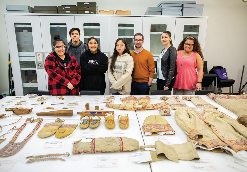 Group portrait of students with Naskapi items.