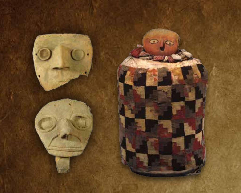 Two mummy masks and a colorful mummy bale.