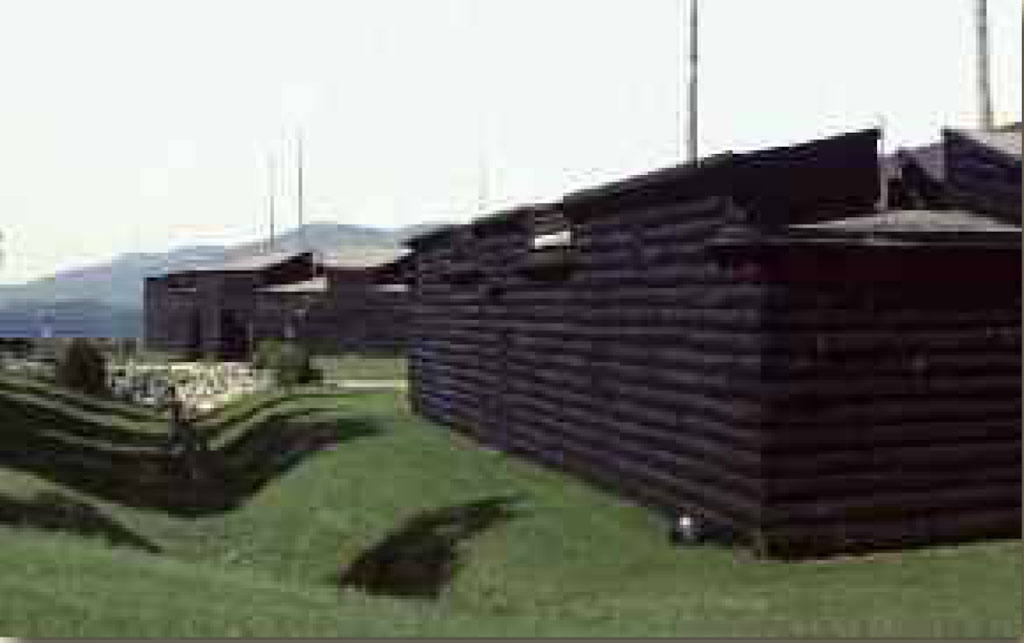 A reconstruction of the fort with wood log walls.