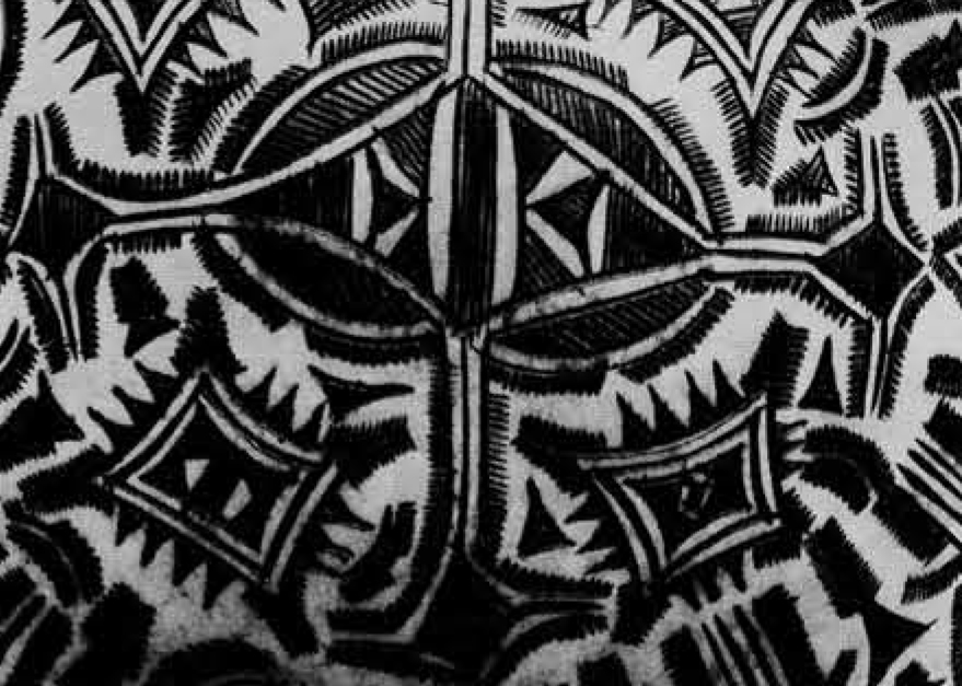 Close up of geometric designs burned into a calabash.