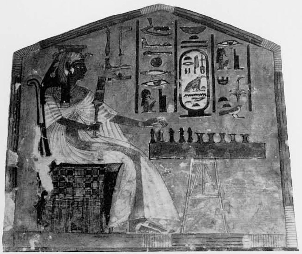 Pentagonal panel showing a seated queen in front of a game board.