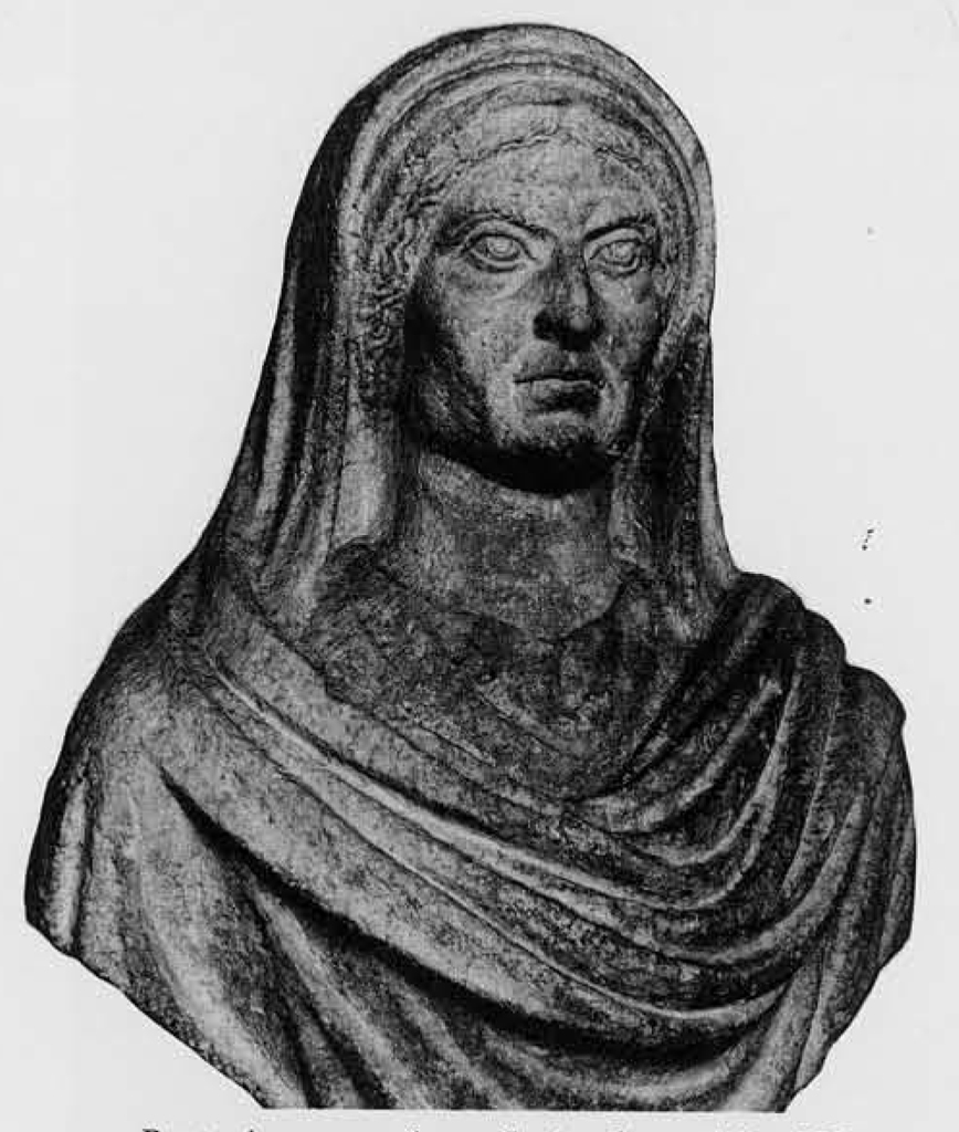 Bust of a Syrian woman with scarf draped over head and shoulders
