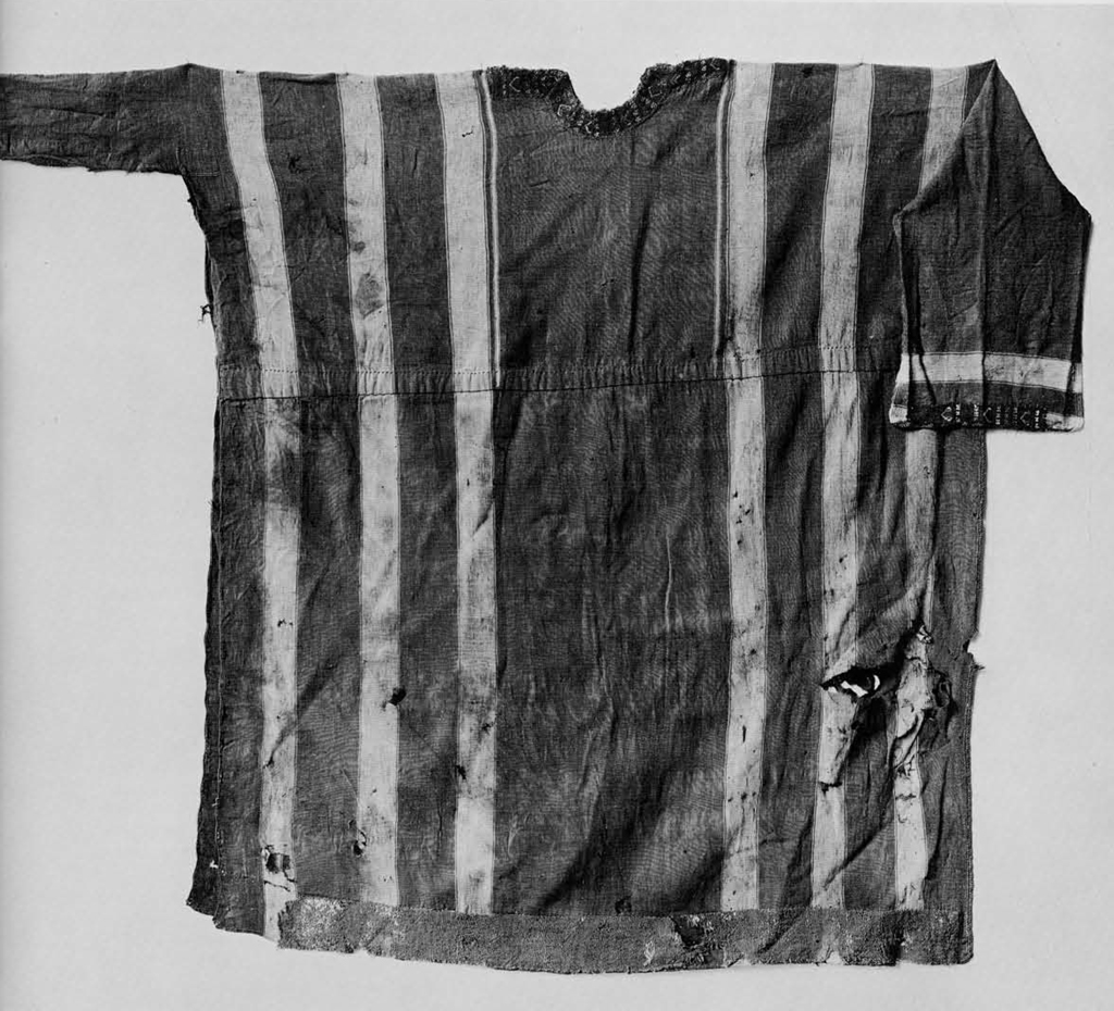A striped tunic, with some holes.