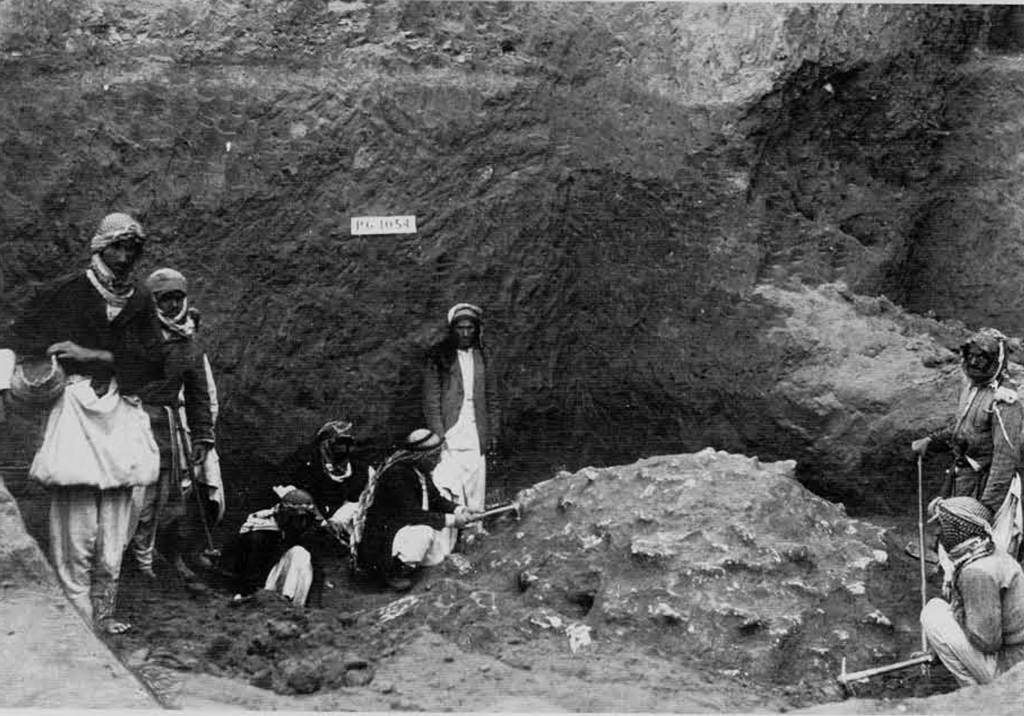 A group of people excavating a tomb.