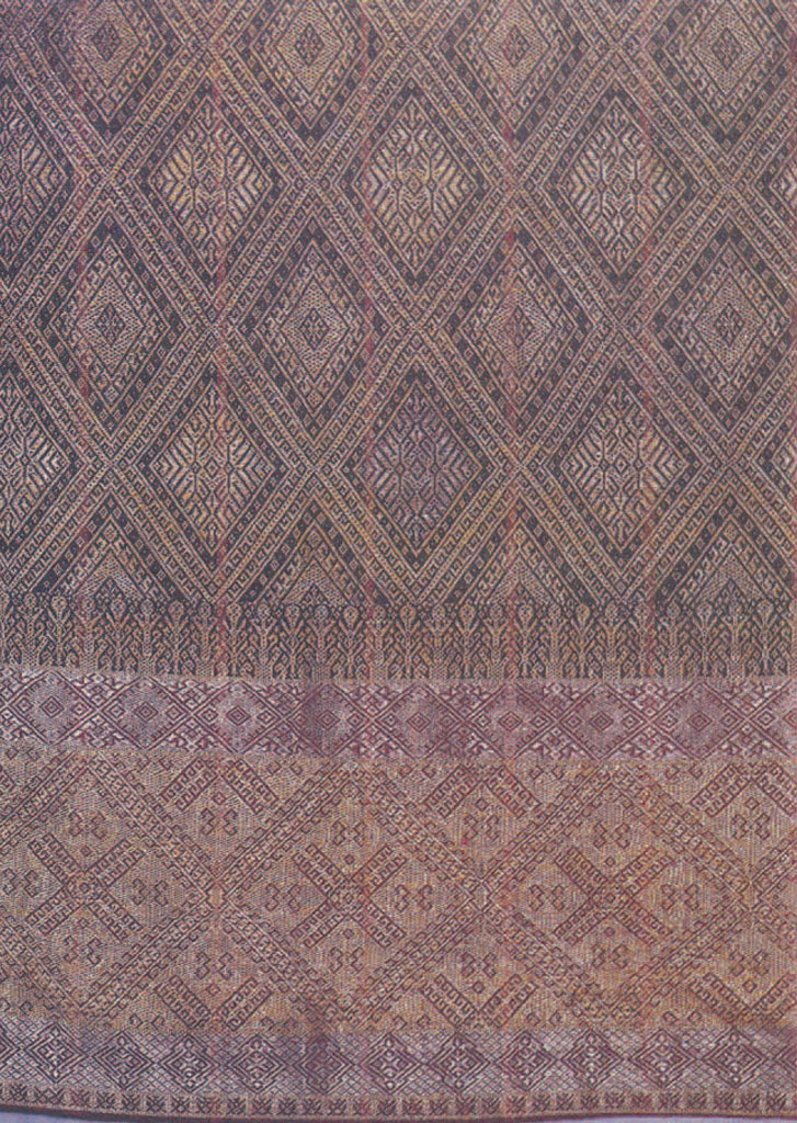 Swath of fabric with interlocking diamond patterns.