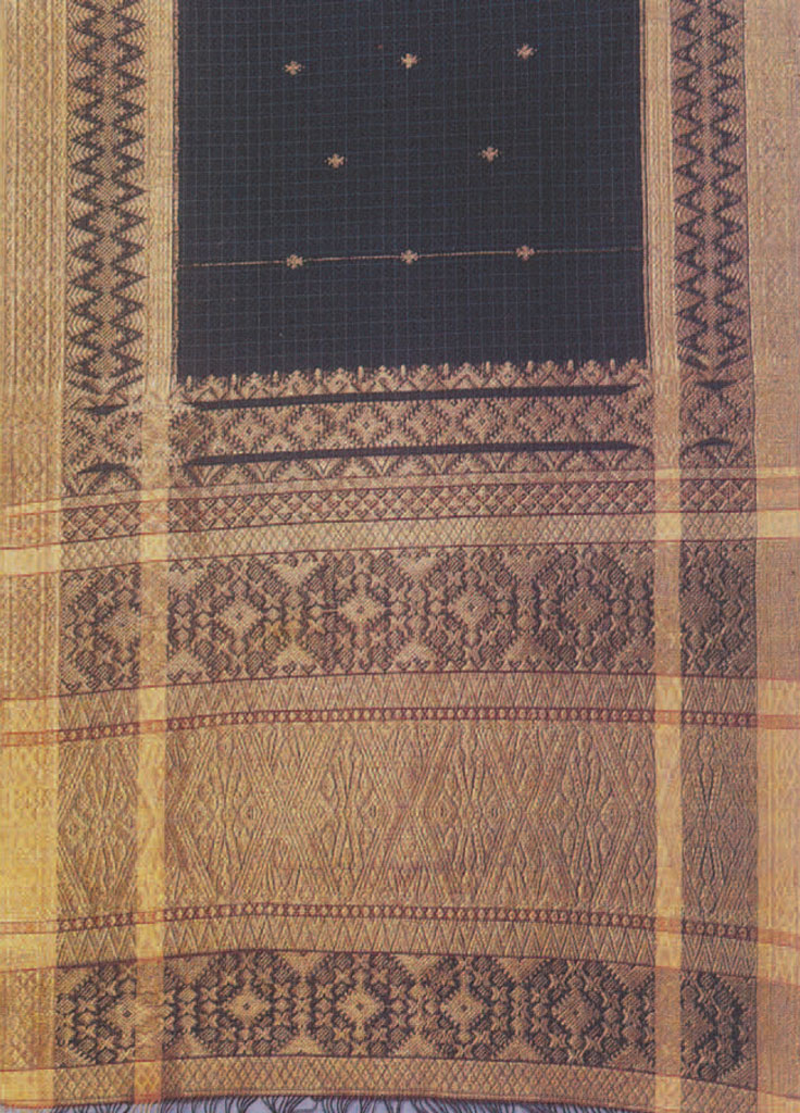 Shawl with a variety of organic inspired motifs woven into it.