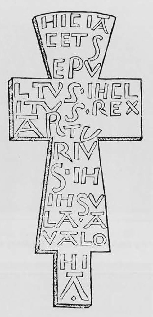 Drawing of a cross covered in writing.