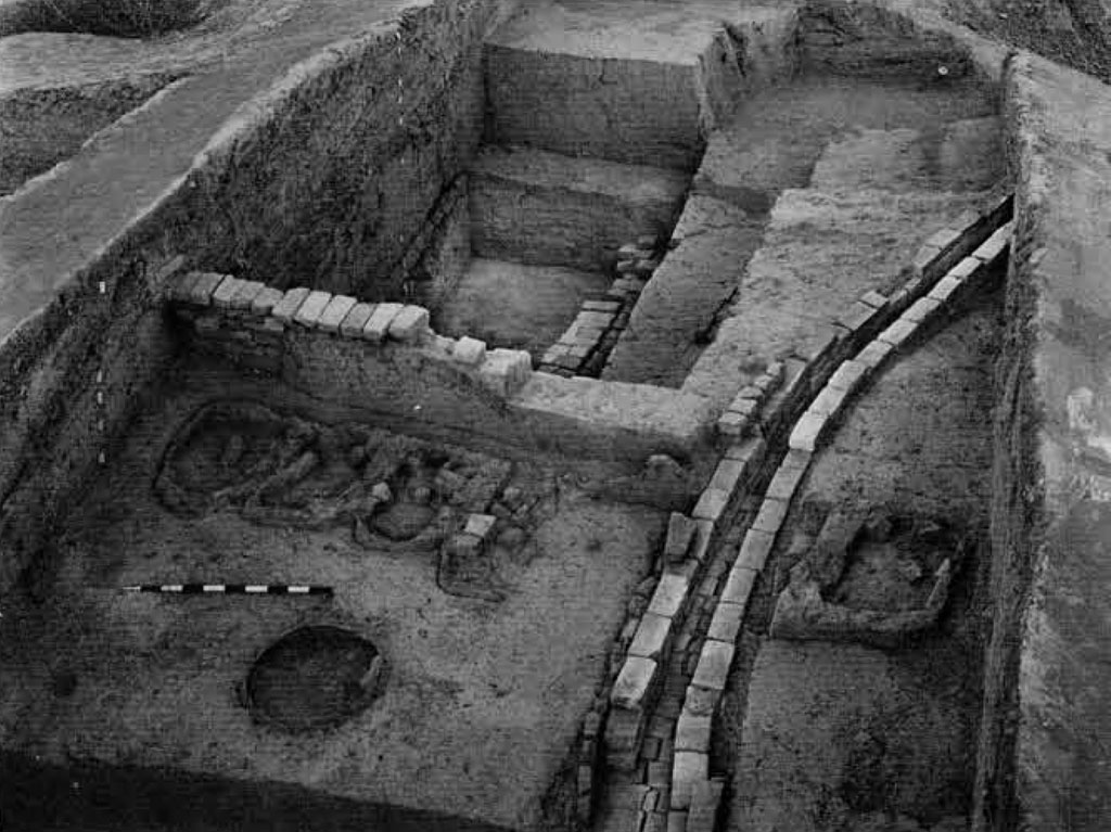 A row of fire altars on an excavated platform.