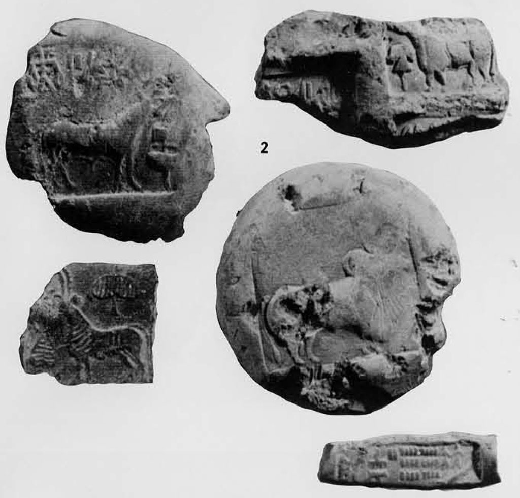 Five terracotta sealings depicting animals.