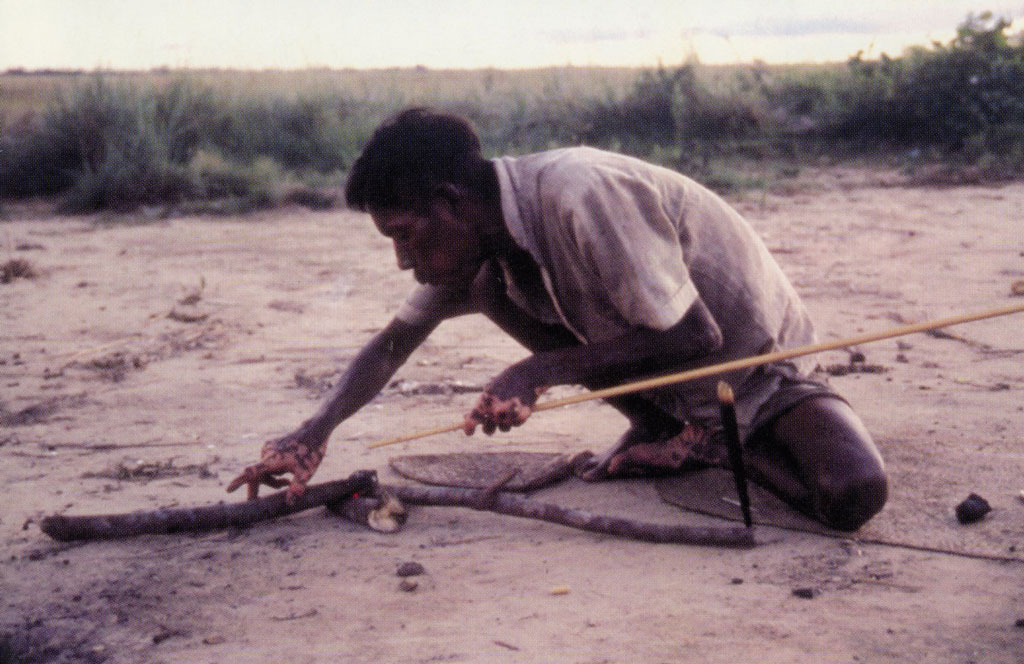 A man making an arrow.