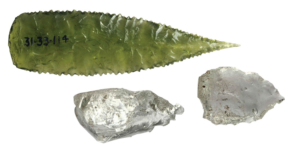 Three glass blades with serrated edges.