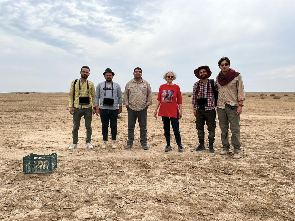 Archaeologists posing for group photo.