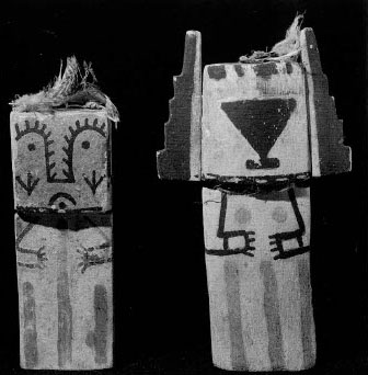 Two Kachina dolls, standing side by side