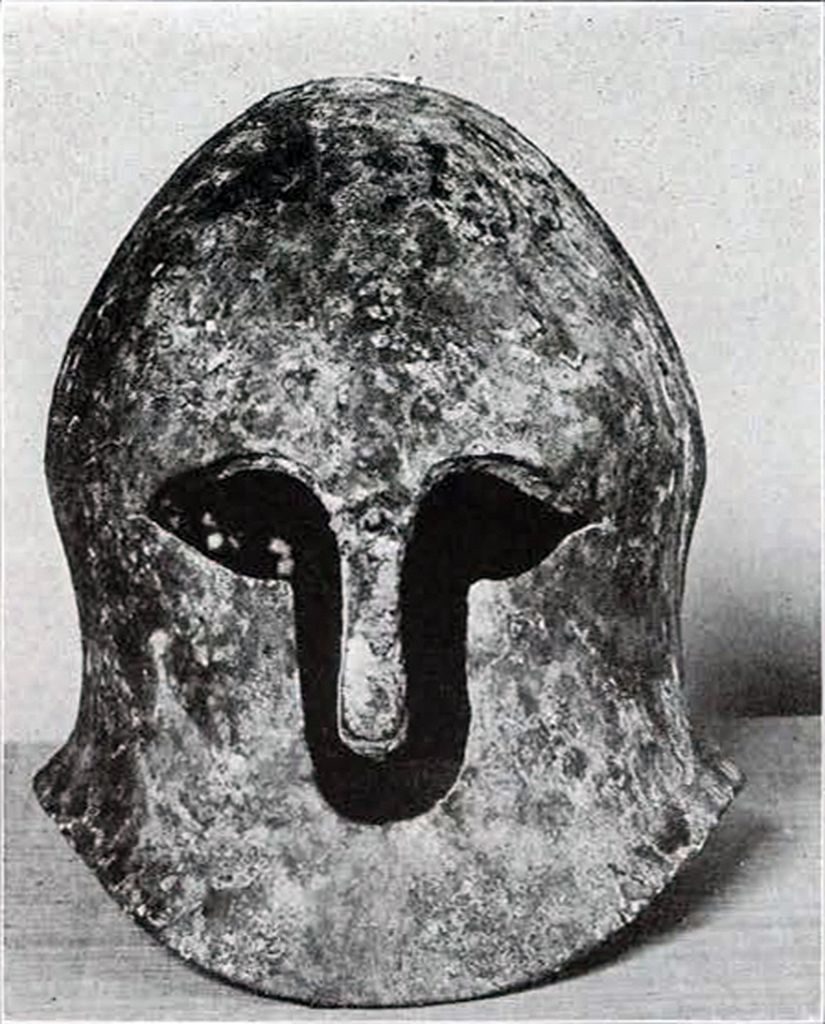 A bronze Corinthian helmet with nose piece, closed below the nose piece
