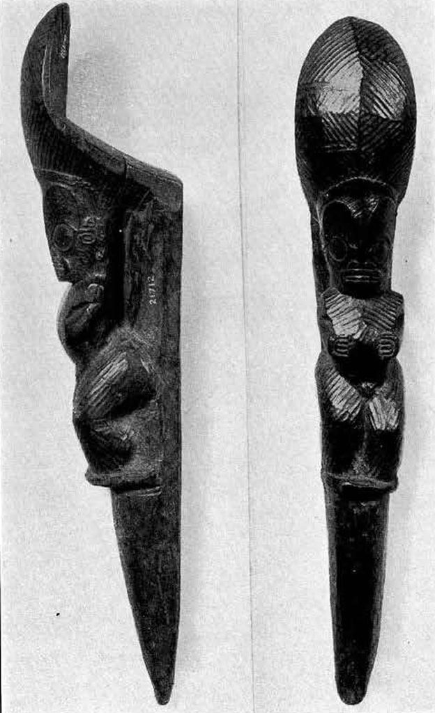 dancing stilts with a human figure carved into the bottom