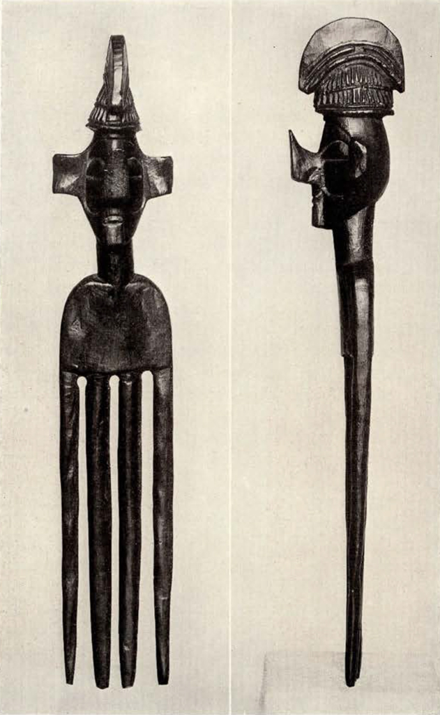 Four pronged hair comb or ornament with a face with a large head crest and upturned nose on the handle, front and side views