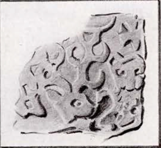 Seal impression of several animal heads with horns or antlers, top left corner missing