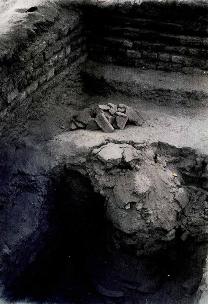 excavated floor showing a collapsed drain