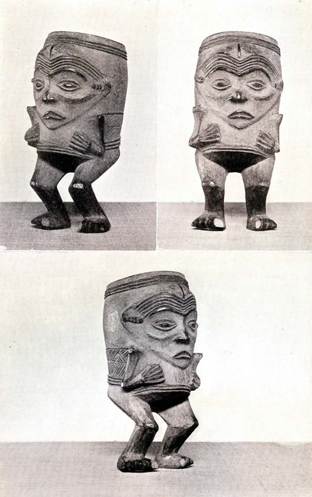 Front and two side views of a carved wood cup with a face and hands on the front of its cylindrical body, and is standing on two legs