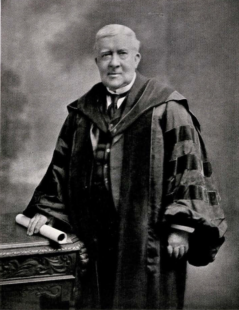 Portrait of Charles Harrison in regalia with award