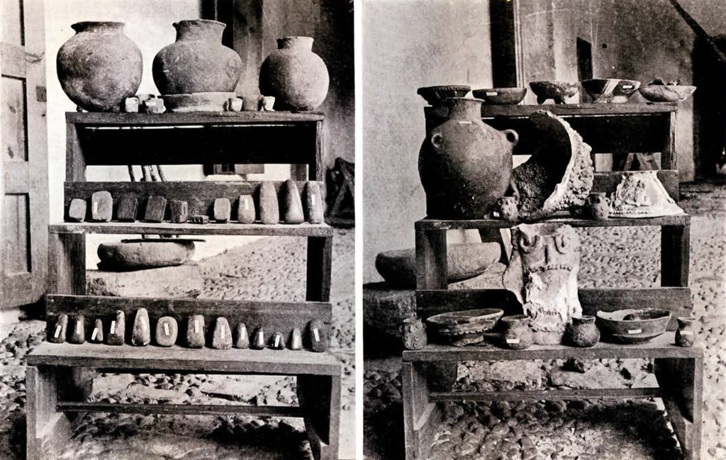 Many carved stone vases, jars, and bowls on shelves