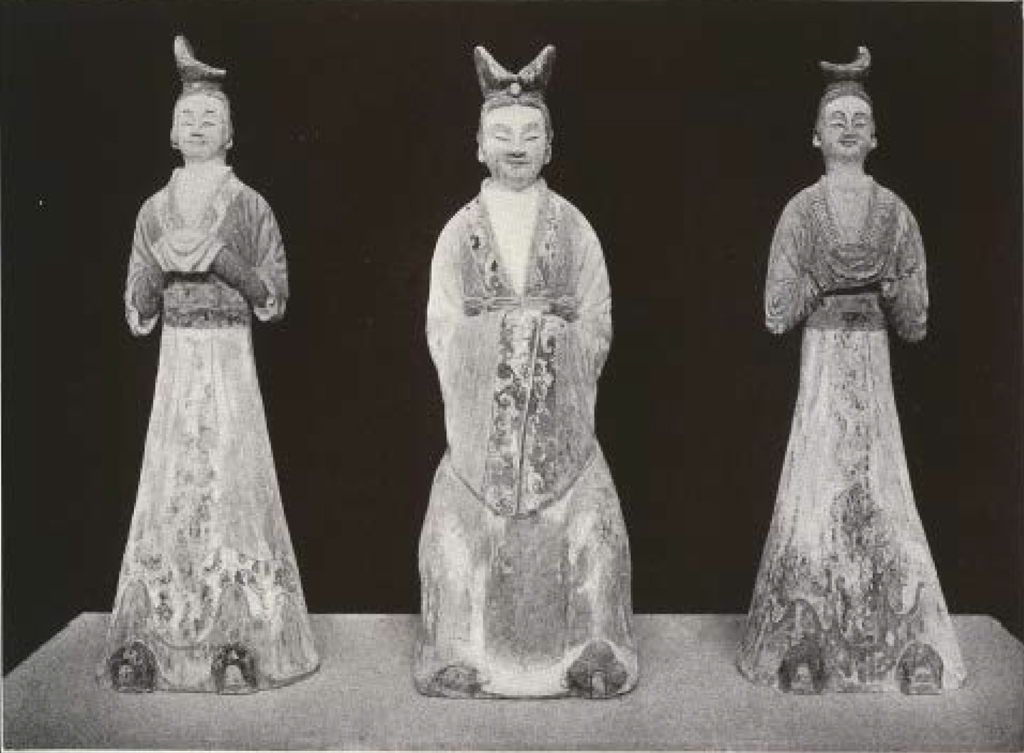 Princes figure between two lady in waiting figures