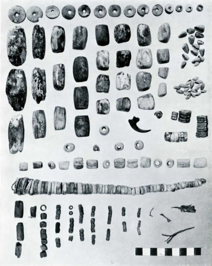 Many small round and cylindrical objects, likely beads