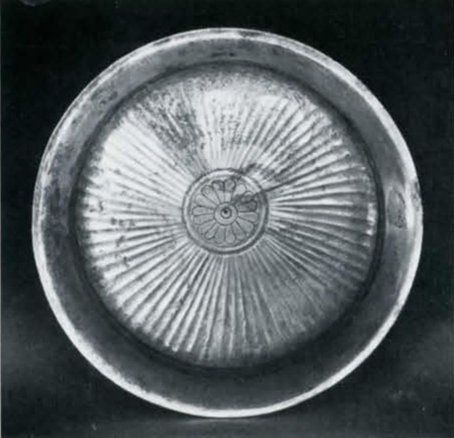 Silver bowl with rosette design in the middle