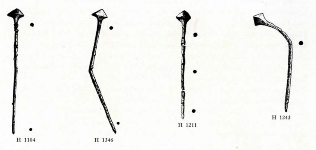 drawings of four pins, some of which are bent