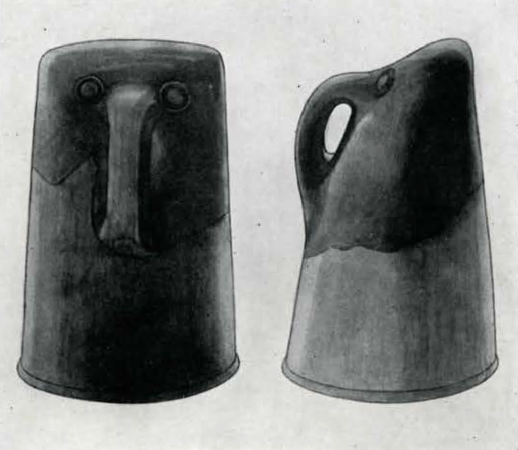 Drawing of side and front views of cylindrical bodied object with a handle or trunk and elephant head