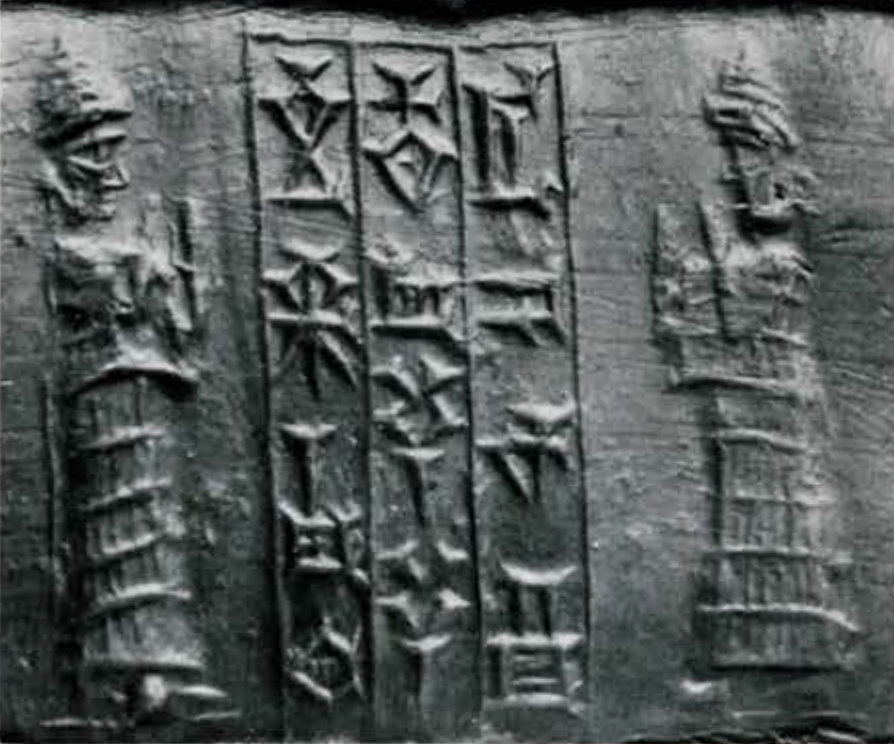 Cylinder seal impression with a figure in a tiered garment and inscription